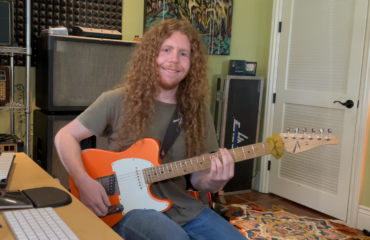 Sean Ashe guitar in hand interview with the talented musician